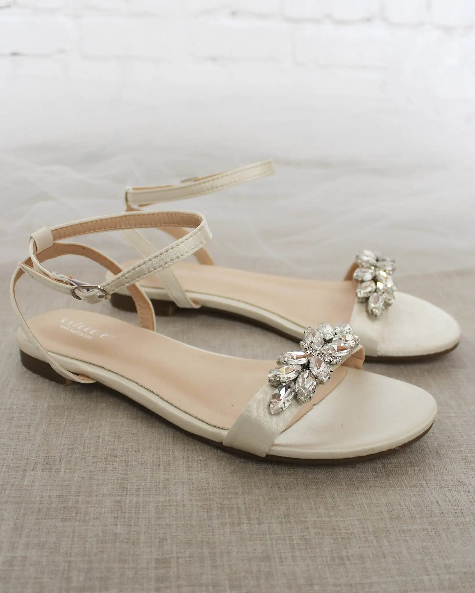 Ivory Satin Flat Sandal with Butterfly Brooch and Ankle Strap