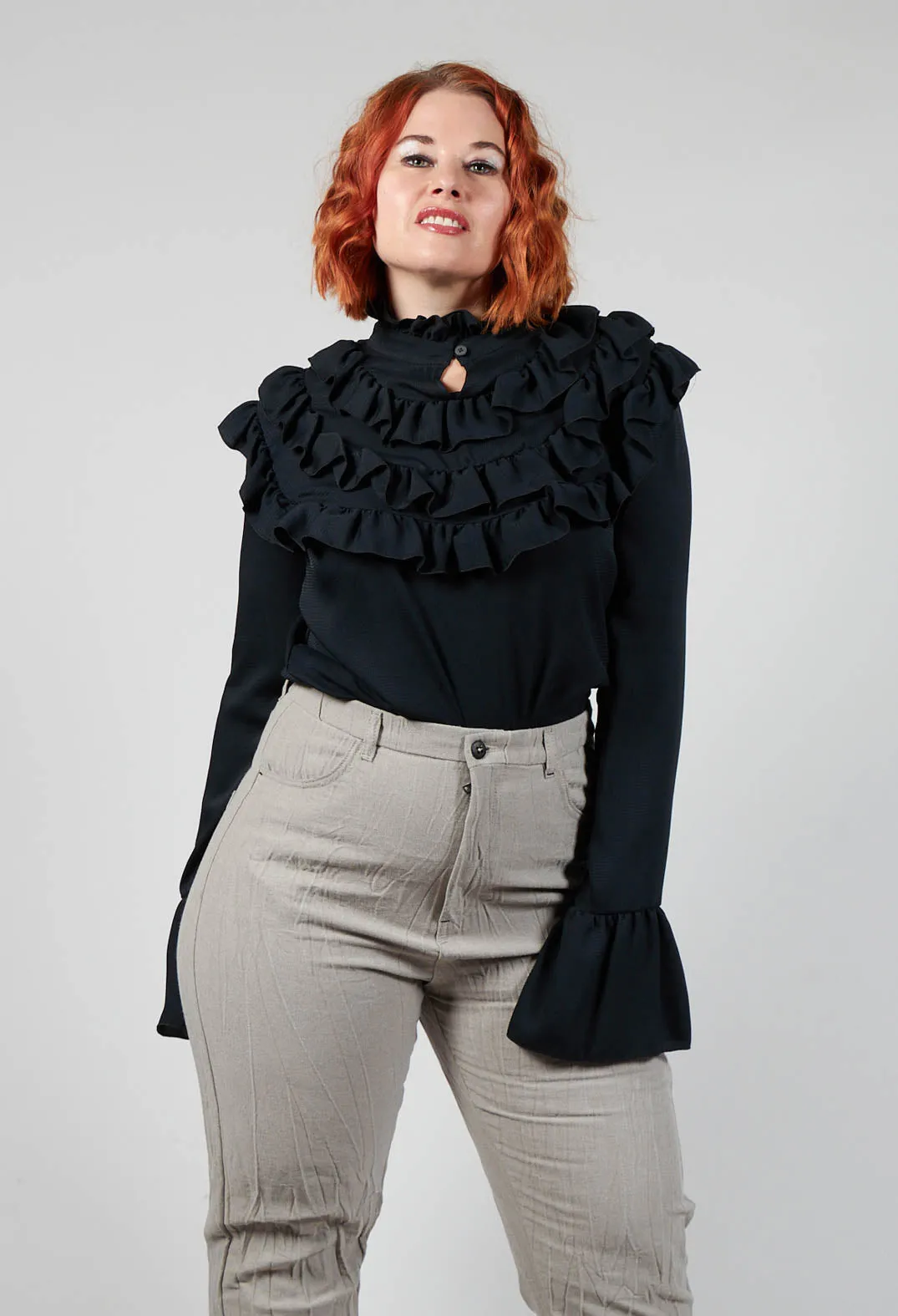 Long Sleeved Blouse with Ruffled Bib in Black