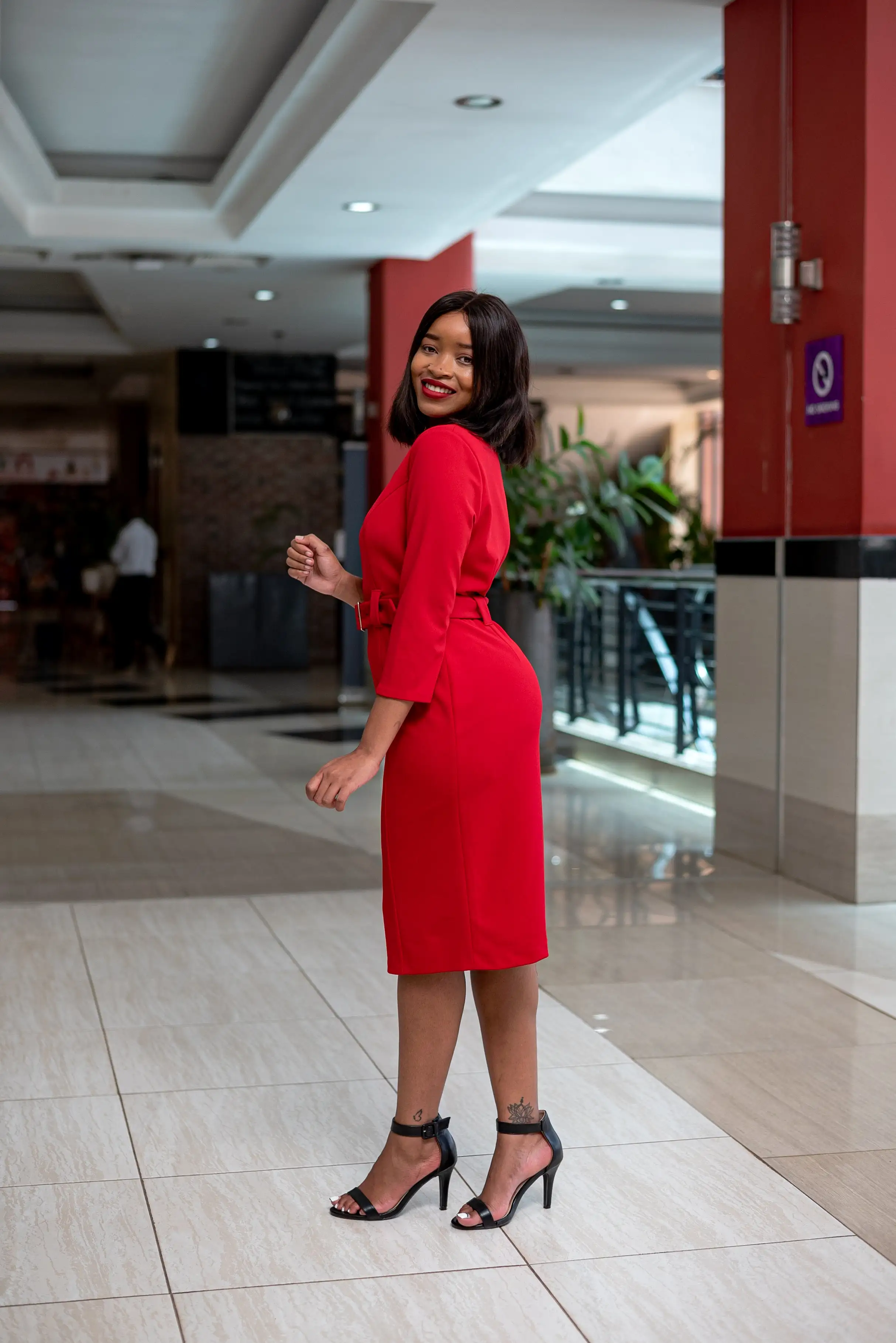 Red bodycon belt dress