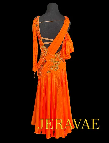 Resale Artistry in Motion Bright Orange Smooth Ballroom Dress with Gold Lace Appliqué, One Long Sleeve, Ruffle Detail, and Swaro