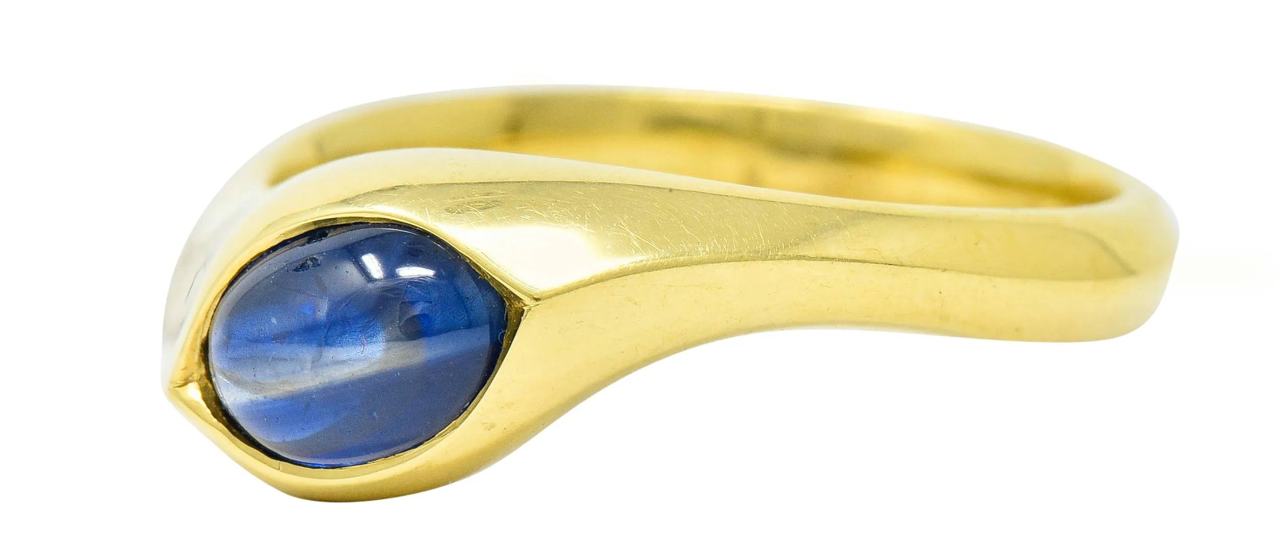 Vintage Sapphire Cabochon 18 Karat Gold Eyelet Band Ring Circa 1990s